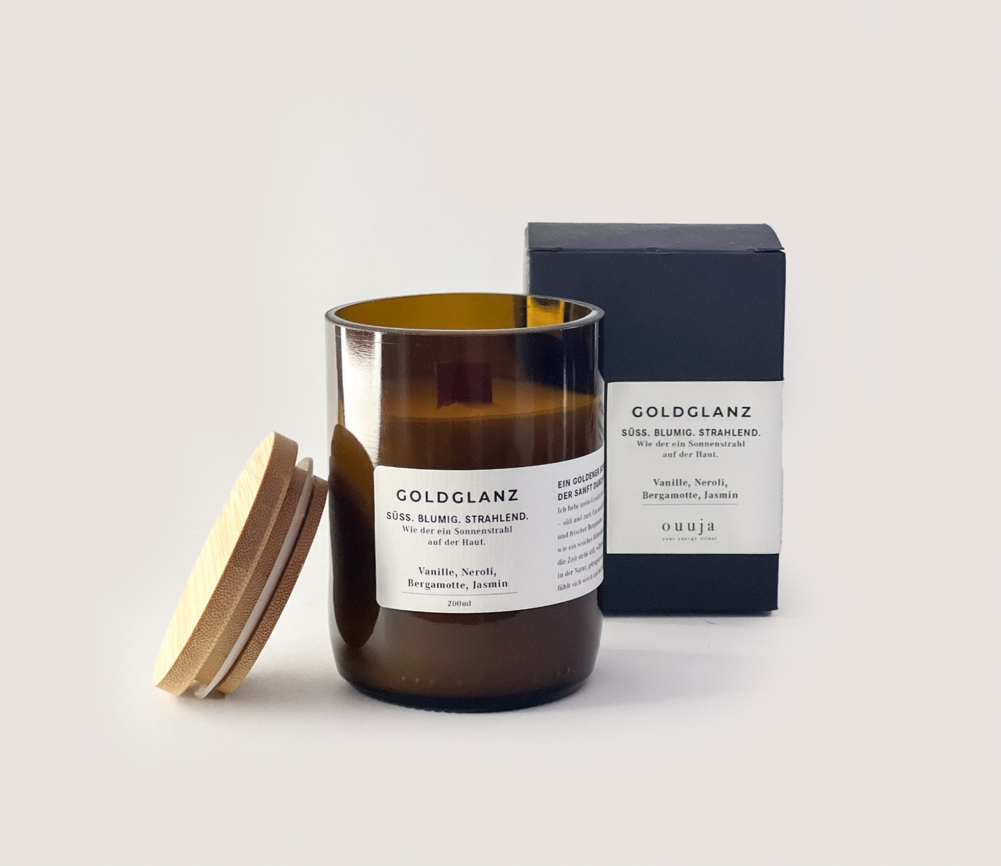 GOLDGLANZ 200ml Duftkerze süß blumig mit Vanille, Neroli, Bergamotte und Jasmin in braunem Glas mit Holzdeckel und schwarzer Verpackung