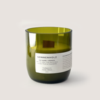 Green glass candle labeled SONNENHOLZ 200ml with cashmere and warm woods scent.