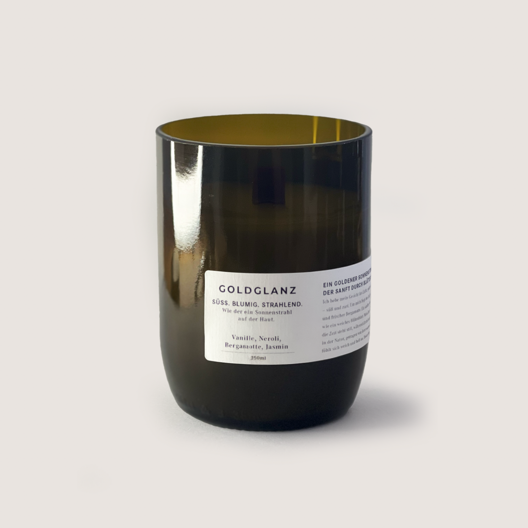 GOLDGLANZ 200ml scented candle with vanilla, neroli, bergamot, and jasmine fragrance in a black glass container